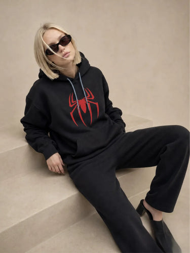 Spiderman hoodie for women front sitting pose