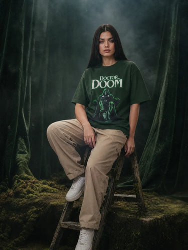 Dr Doom T-Shirt For Women front sitting on table
