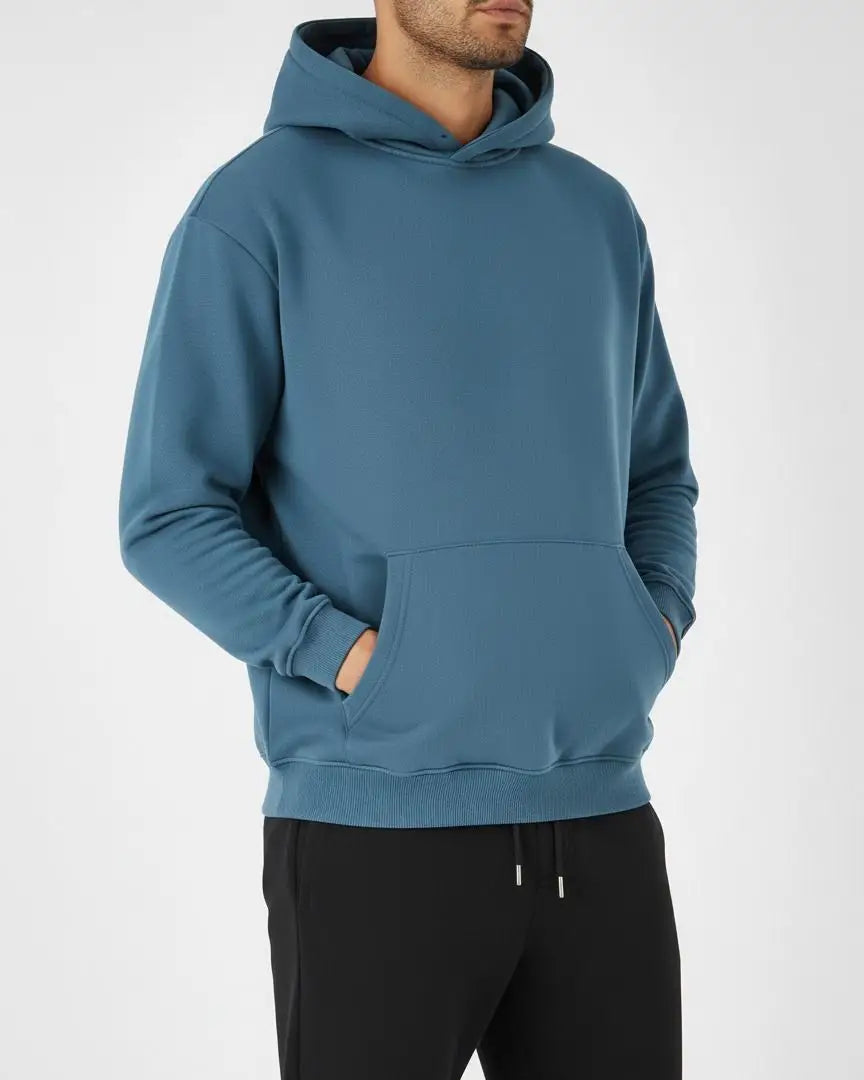 Person wearing a blue hoodie on a white background