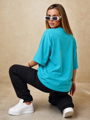 Johnny Bravo Merchandise t shirt girl sitting back