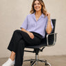 Lavender Shirt For Women sitting on chair front pose