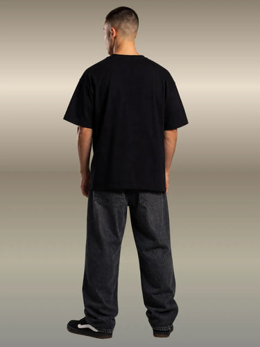 t shirts from stranger things standing back